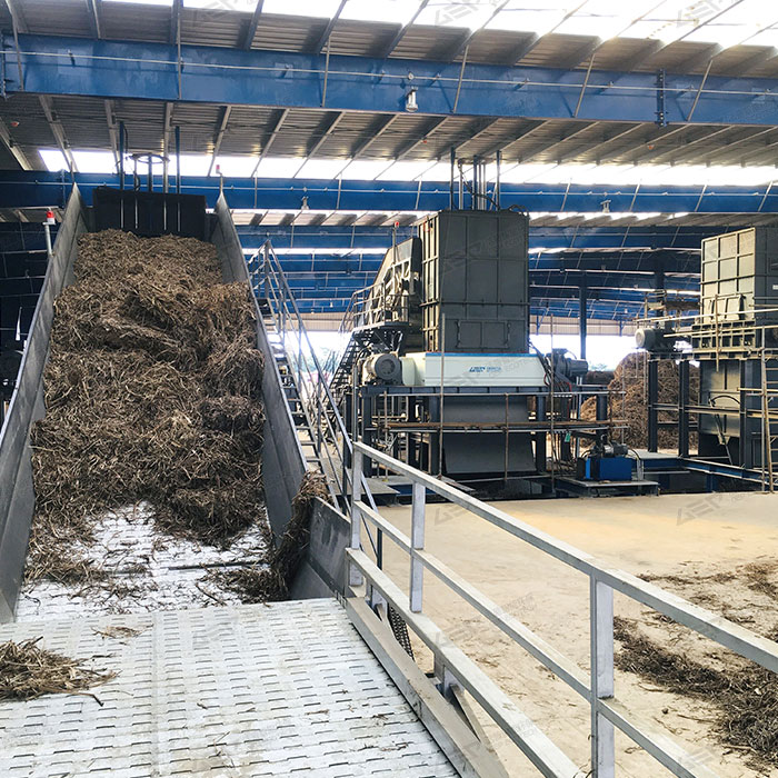 shredding straw with industrial shredder