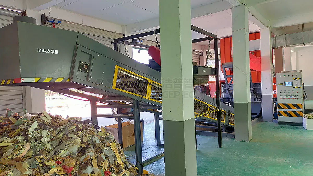 output particle size of twin shaft shredder